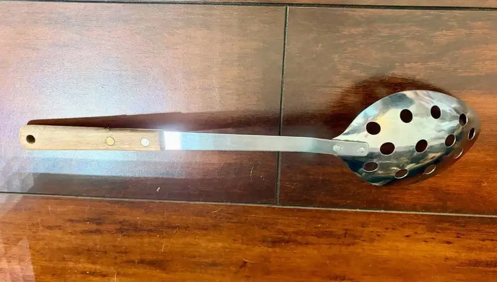 Vintage Stainless Steel Slotted Serving Spoon with Wooden Handle, Made in Japan